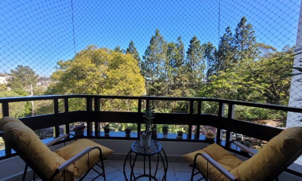 Apartamento de três dormitórios 