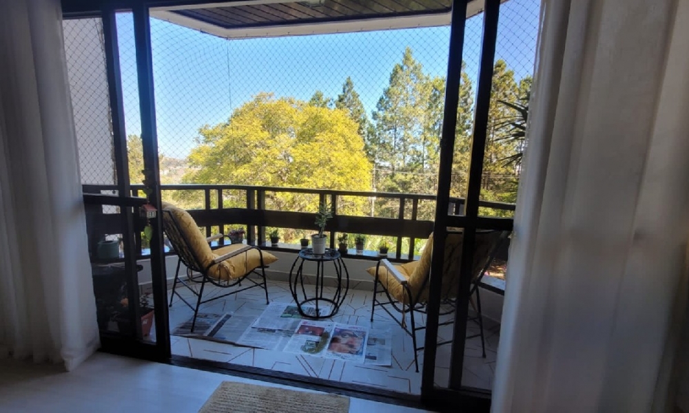 Apartamento de três dormitórios 
