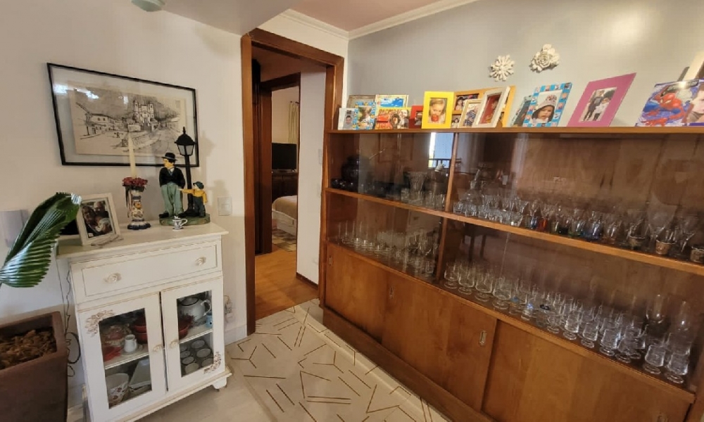 Apartamento de três dormitórios 