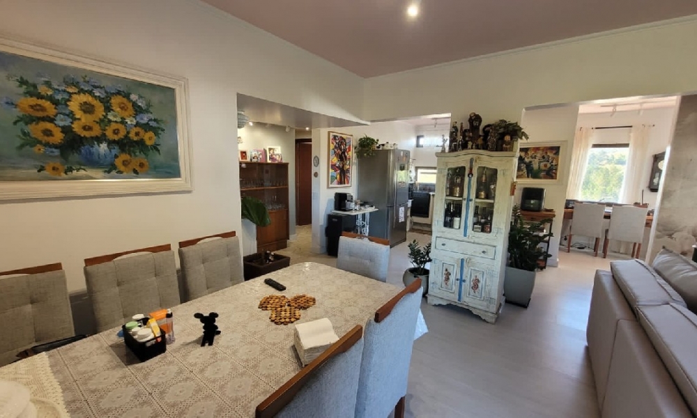 Apartamento de três dormitórios 