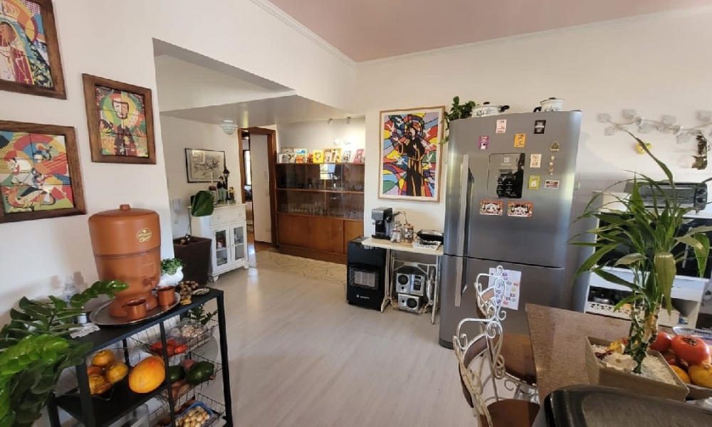 Apartamento de três dormitórios 