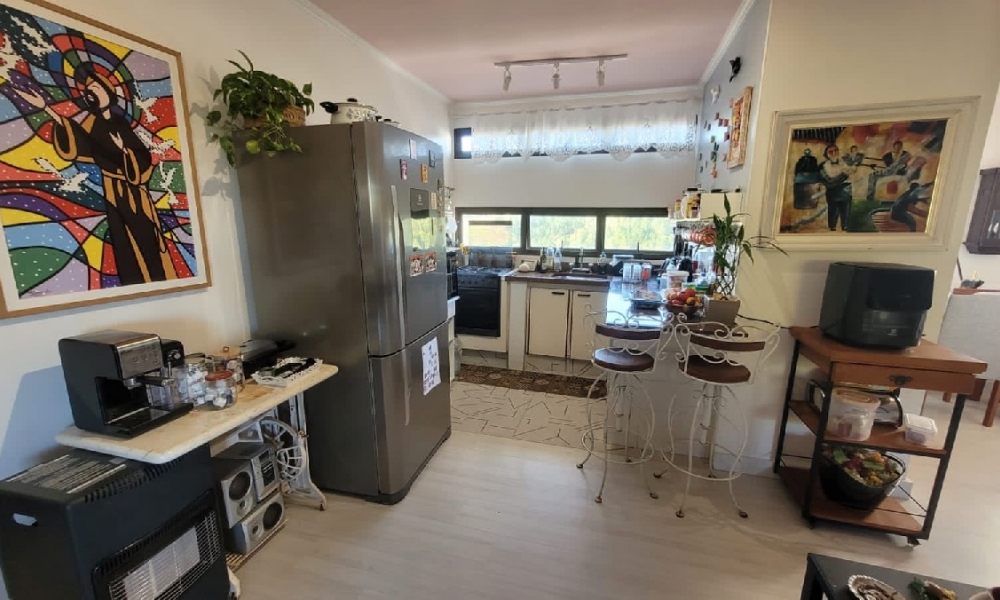 Apartamento de três dormitórios 