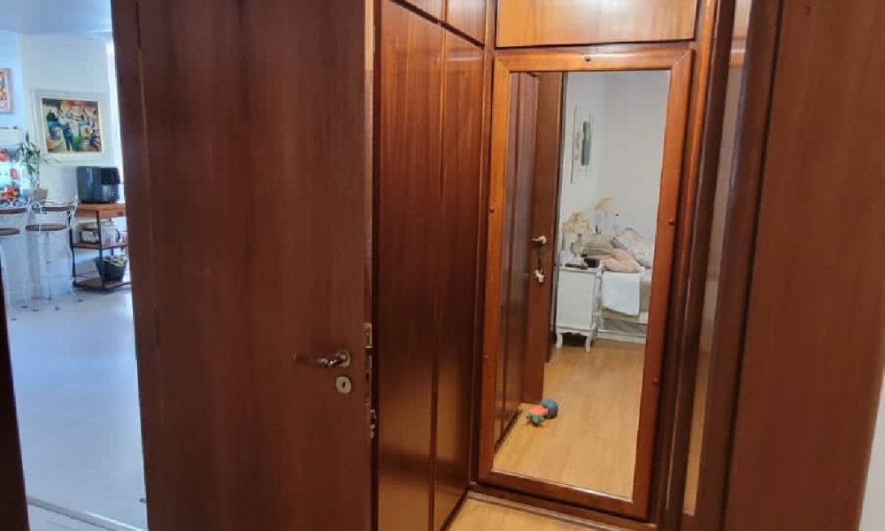 Apartamento de três dormitórios 