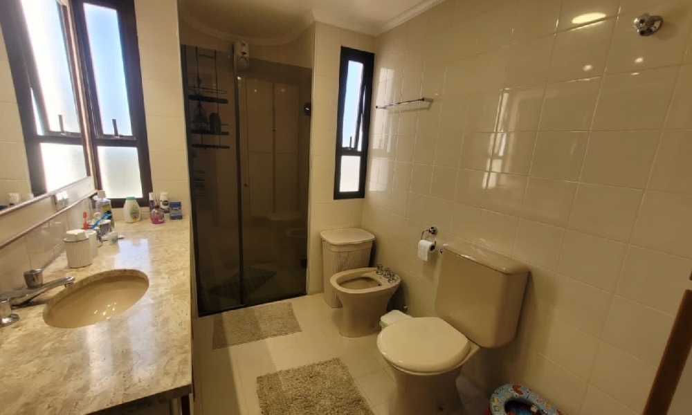 Apartamento de três dormitórios 