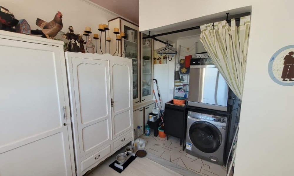Apartamento de três dormitórios 