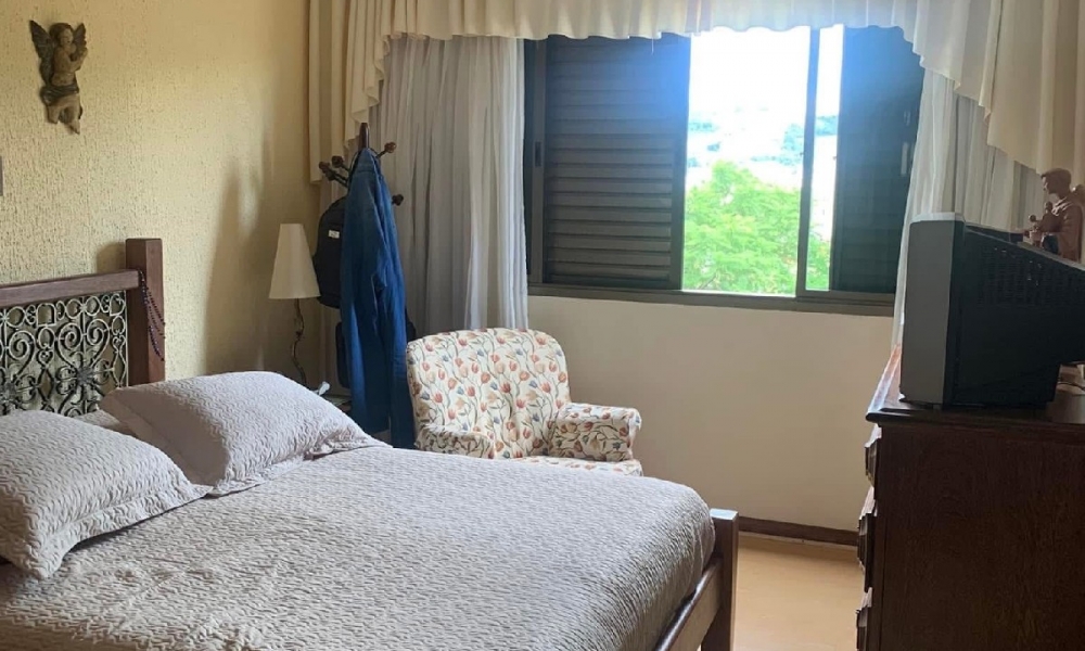 Apartamento de três dormitórios 