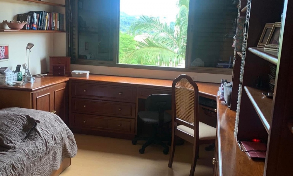 Apartamento de três dormitórios 