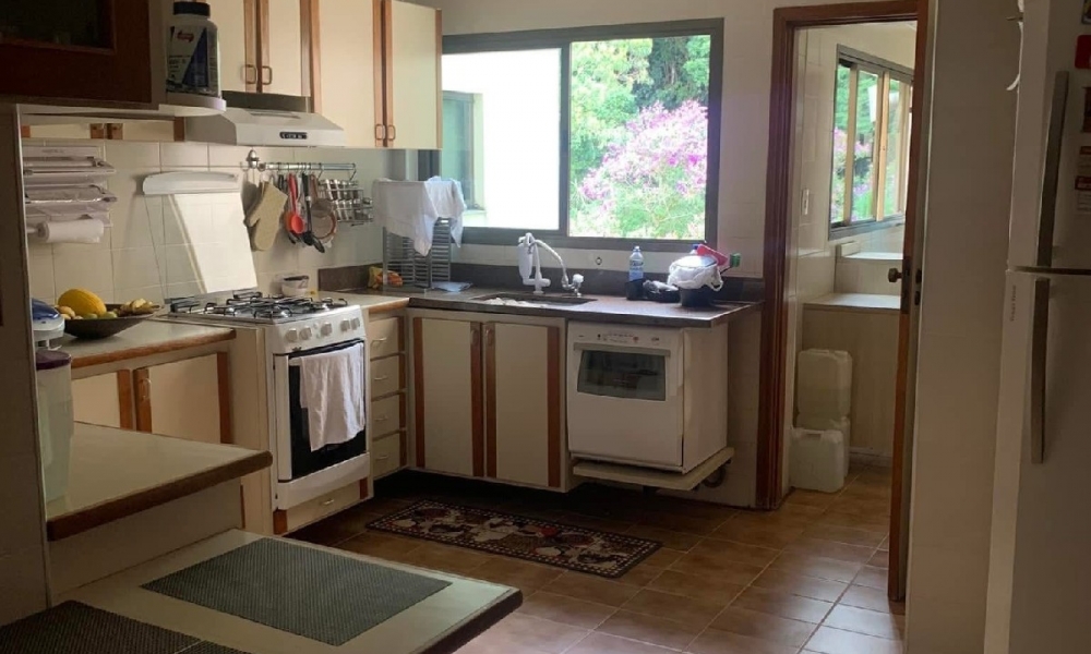 Apartamento de três dormitórios 